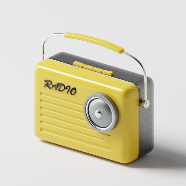 Gelbes Retro-Radio mit einem runden Lautstärkeregler und einem Tragegriff.